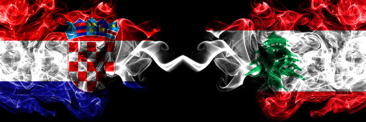 Croatia, Croatian vs Lebanon, Lebanese smoky mystic flags placed side by side. Thick colored silky abstract smoke flags.