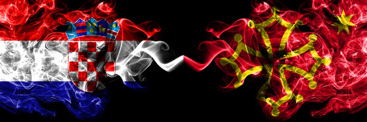 Croatia, Croatian vs Occitania smoky mystic flags placed side by side. Thick colored silky abstract smoke flags.