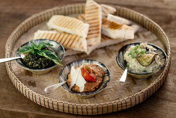 turkish meze vegetarian tapas snack platter on rustic wood table