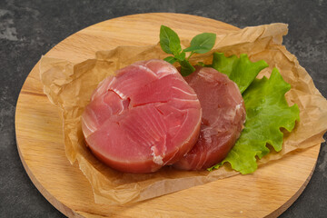 Raw tuna round steak for grill
