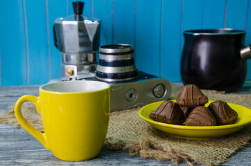 Still life with coffee beans on the wooden background