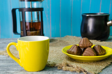 Still life with coffee beans on the wooden background