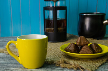 Still life with coffee beans on the wooden background