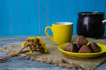 Still life with coffee beans on the wooden background