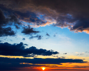 Clouds at sunset, amazing sky, nature background