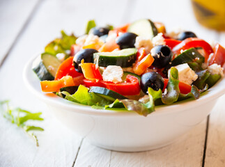 Greek salad with vegetables and feta cheese, healthy vegetable meal