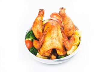 roasted chicken and potatoes on white plate