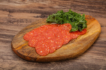 Italian spycy pepperoni sausage slices