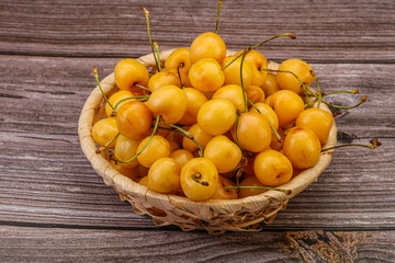Sweet ripe yellow cherry heap