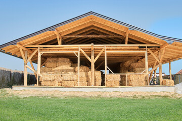 Straw bale house construction with a roof