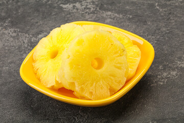 Sweet pineapple rings in the bowl