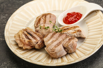 Grilled pork tenderlion with tomato sauce