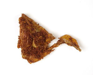 Indonesian spices fried chicken, isolated white background. a portrait of fried chicken thigh and chicken breast.