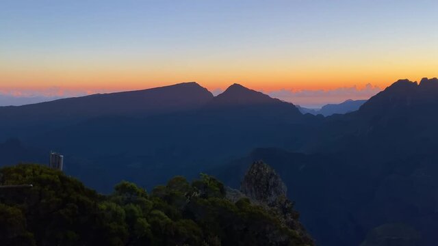 Sunrise over Reunion Island seen from the Piton Maido