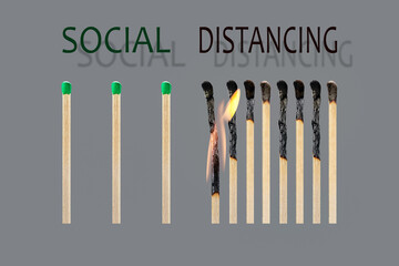 The concept of compliance with social distancing with the use of whole and burnt matches.