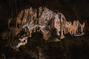 Stalactites and Stalagmites in a cave known as Carlsbad Caverns in Southern New Mexico, USA.