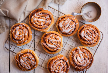 Fresh home baked sweet cinnamon buns with frosting