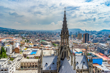 Fototapeta premium Ecuador, Quito, view from one of the clocktower of the Basilica del Voto Nacional with in the background the city of Quito.