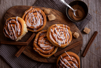 Fresh home baked sweet cinnamon buns with frosting