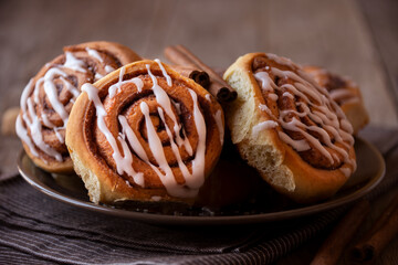 Fresh home baked sweet cinnamon buns with frosting