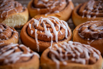 Fresh home baked sweet cinnamon buns with frosting
