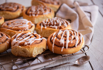 Fresh home baked sweet cinnamon buns with frosting