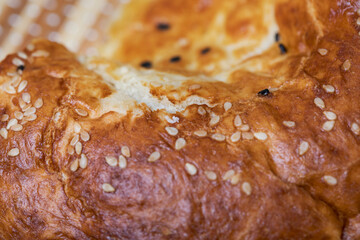 National flatbread with tandoor sesame seeds. Traditional homemade bread.