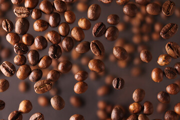 Coffee beans background on black background
