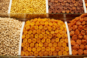 Oriental sweets assortment of fresh and healthy nuts and dried fruits on the market