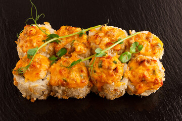 Japanese food: Set of salmon sushi and rolls with salmon and eel