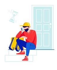 The courier sits near the door waiting for customers. The delivery man is waiting. Difficulties in the work of the courier and delivery service. The courier is on the landing, near the door. 
