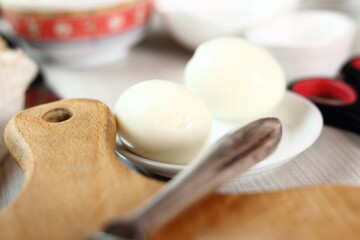 Peeled hard boiled eggs. Making Salmon in Puff Pastry Series.