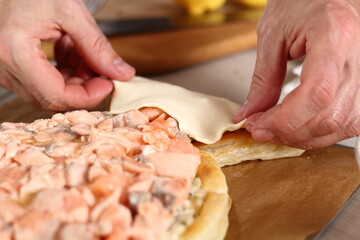 Cover tail of pie. Making Salmon in Puff Pastry Series.