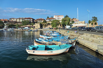 Naklejka na ściany i meble Fishing boats berthed in marina in the Old Town of Nessebar, Bulgaria