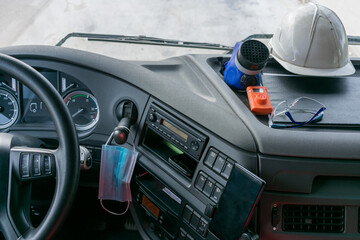 Personal protective equipment in the cabin of a truck that transports dangerous goods, consisting...