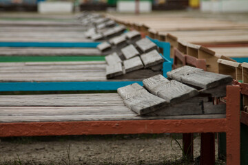 wooden sun loungers on the beach