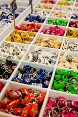 Kinderdijk, The Netherlands, August 2019. Souvenir Dutch clogs, produced in different shapes and colors, make a good show in the display.