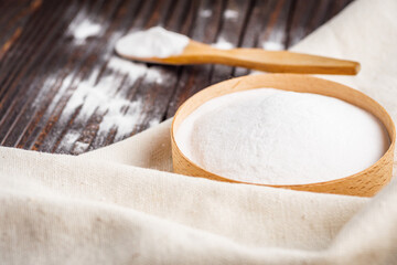 baking soda powder on wooden rustic background background