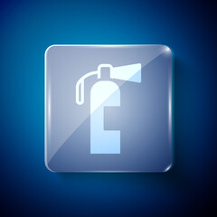 White Fire extinguisher icon isolated on blue background. Square glass panels. Vector.