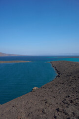 Baie des Requins (Bay of Sharks), Djibouti.
Is a deep lake inside the  the Bay of Ghoubet, Djibouti It is a crater formed due to a phreatic eruption. It is a well known diving site.