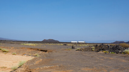 Highway passing through the Lava fields of Djibouti, East Africa
A passing tanker carrying fuel supplies to Ethiopia