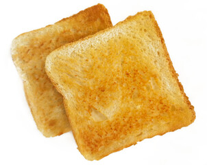 Slices of whole wheat bread toast on a white background