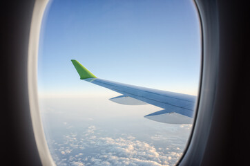 View from the windows seat in an airplane, next to the wing