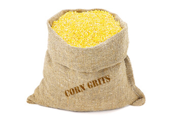 Corn grits in a sack isolated on a white background. Corn grits in a burlap sack. Healthy food....