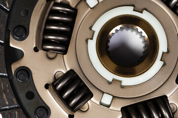 Close-up on the new clutch disc. Background preparation for repairs of the chassis and gearbox