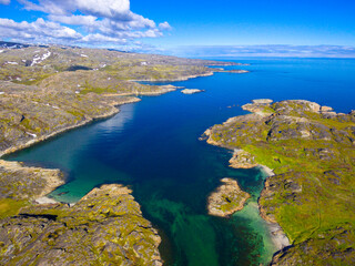Fototapeta na wymiar Beautiful arctic summer landscape on Barents sea shoreline