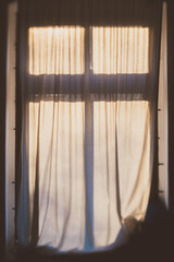 closed curtain in front of window