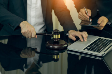 Judge gavel with Justice lawyers having team Concepts of Law and Legal services