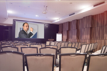 Online education,male african  teacher on the projector screen. Online education concept with teacher giving lessons to the students. Coronavirus quarantine, lockdown.
