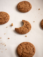 Oatmeal cookies on white plate in morning light